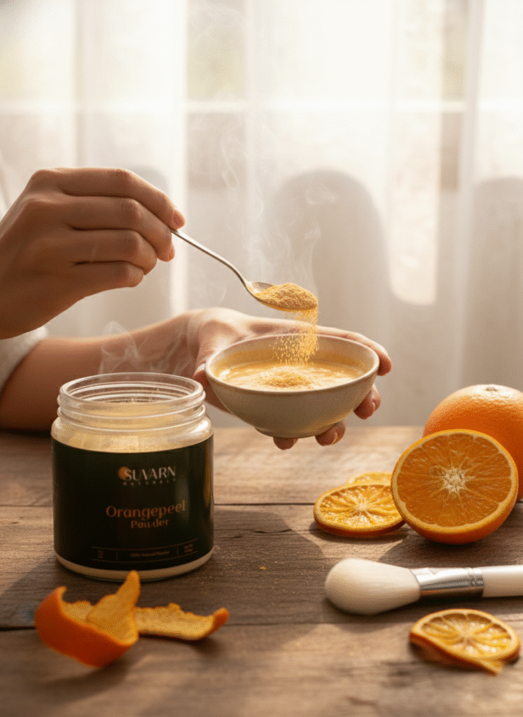 Suvarn Naturals orange peel powder being mixed in a bowl for DIY face pack, natural herbal skincare for skin brightening, tan removal, and glowing skin treatment at home.