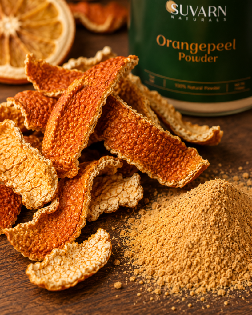 Macro photograph of dried orange peel strips with visible texture, alongside a small heap of fine orange powder.